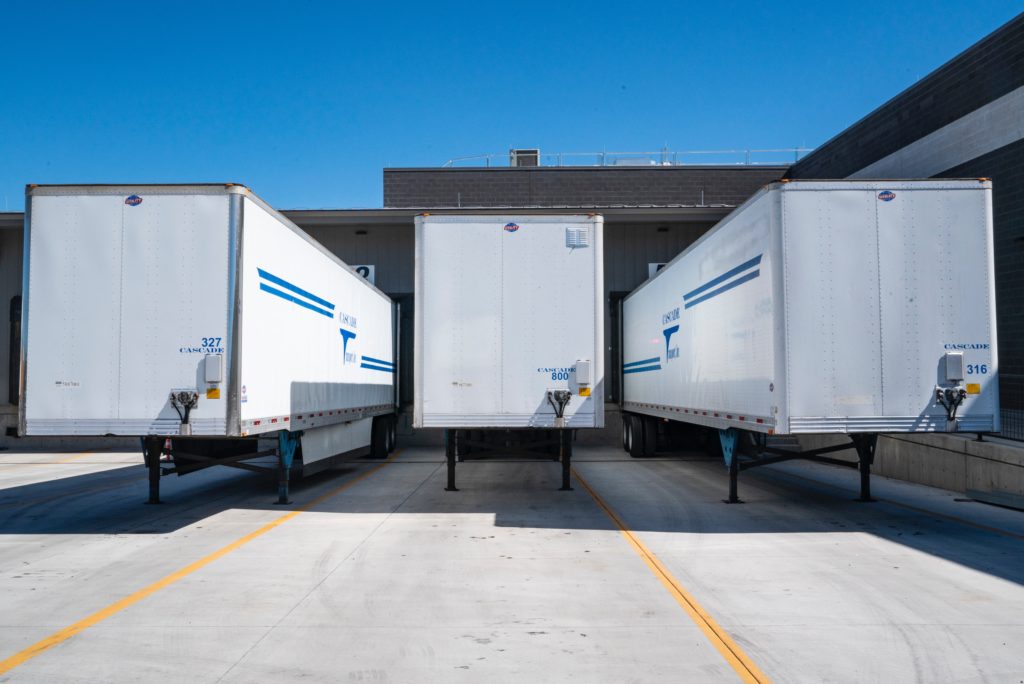 three-trucks-in-loading-dock