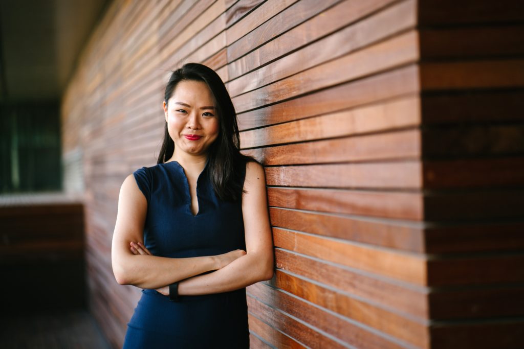 woman-leader-brick-backdrop